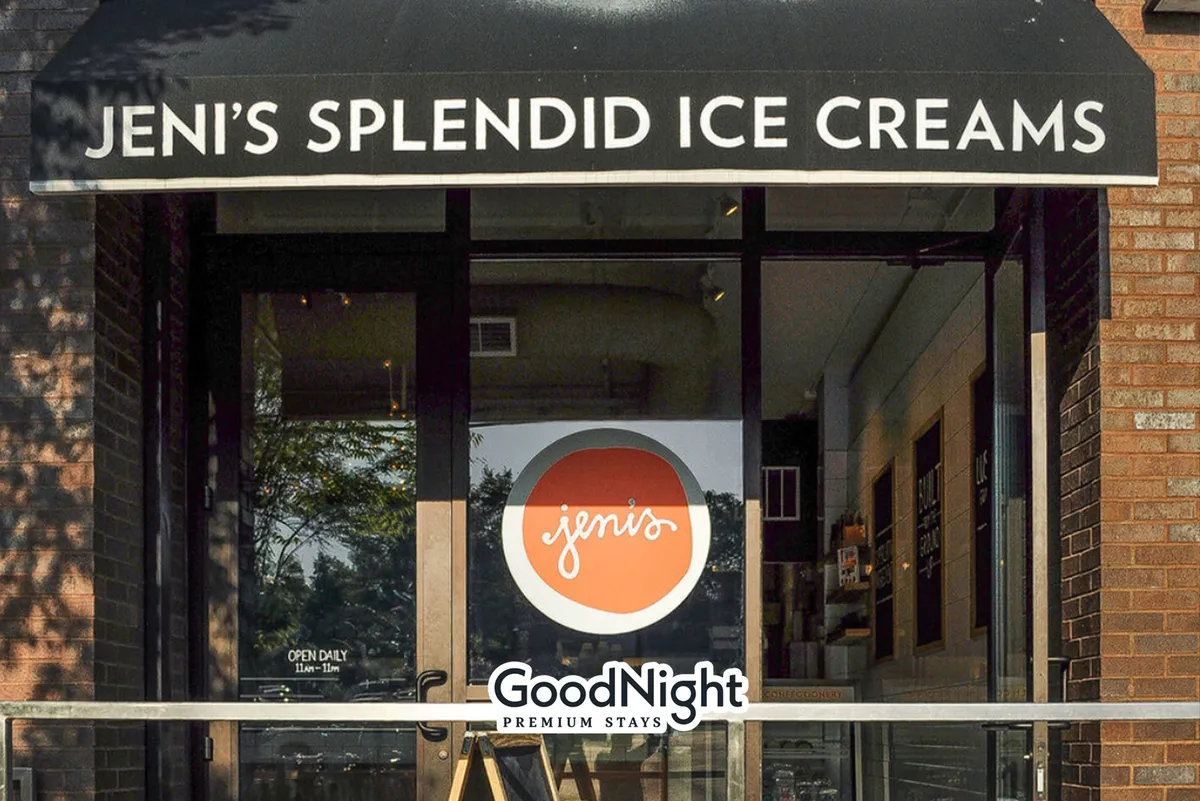 The cheerful storefront of Jeni’s Splendid Ice Creams, complete with distinctive signage and playful window displays. The bright, inviting exterior suggests a popular neighborhood spot for sweet treats and casual hangouts.